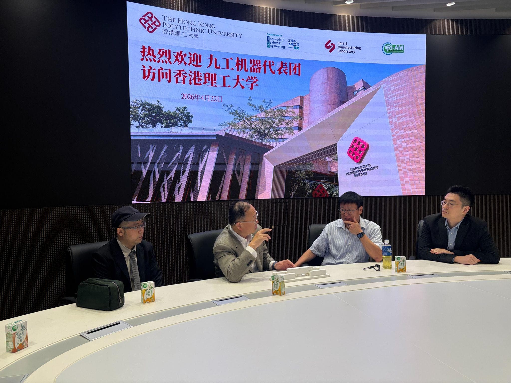 The teams discuss the joint research program